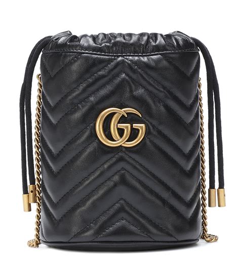 GG Emblem mini bucket bag .